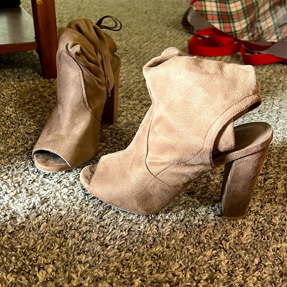 High heel knee length boots